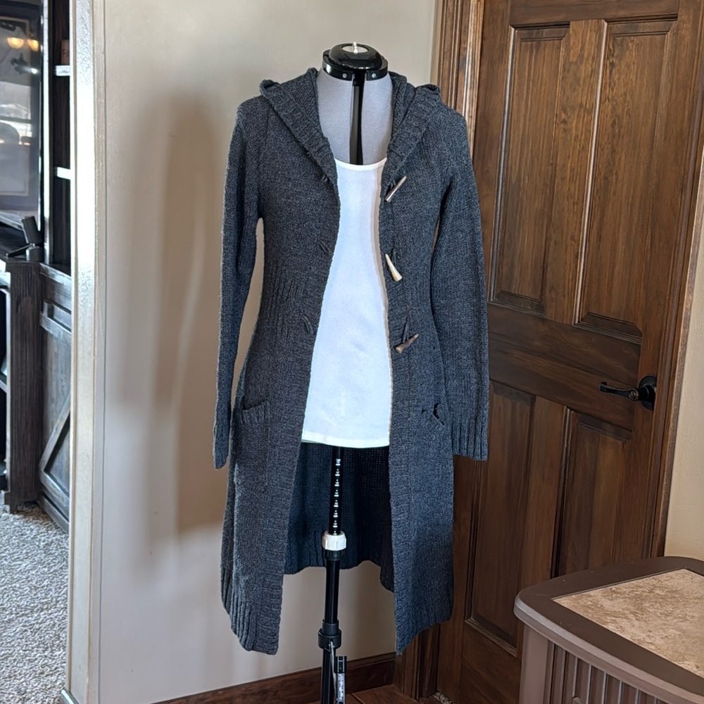 Not sure of the brand or size measurements listed below. Charcoal grey cardigan